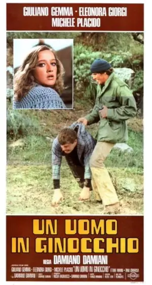 Un uomo in ginocchio